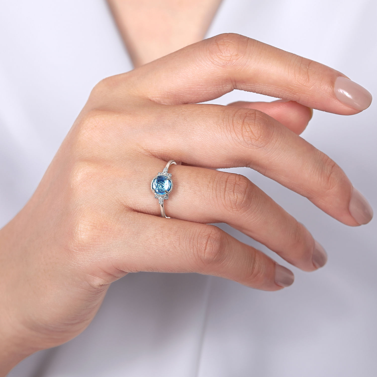 14K White Gold Round Bezel Set Blue Topaz Ring with Diamond Side Accents