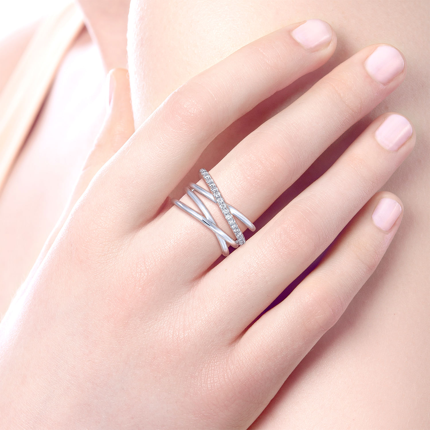 Sterling Silver Intersecting Ring with White Sapphire Center